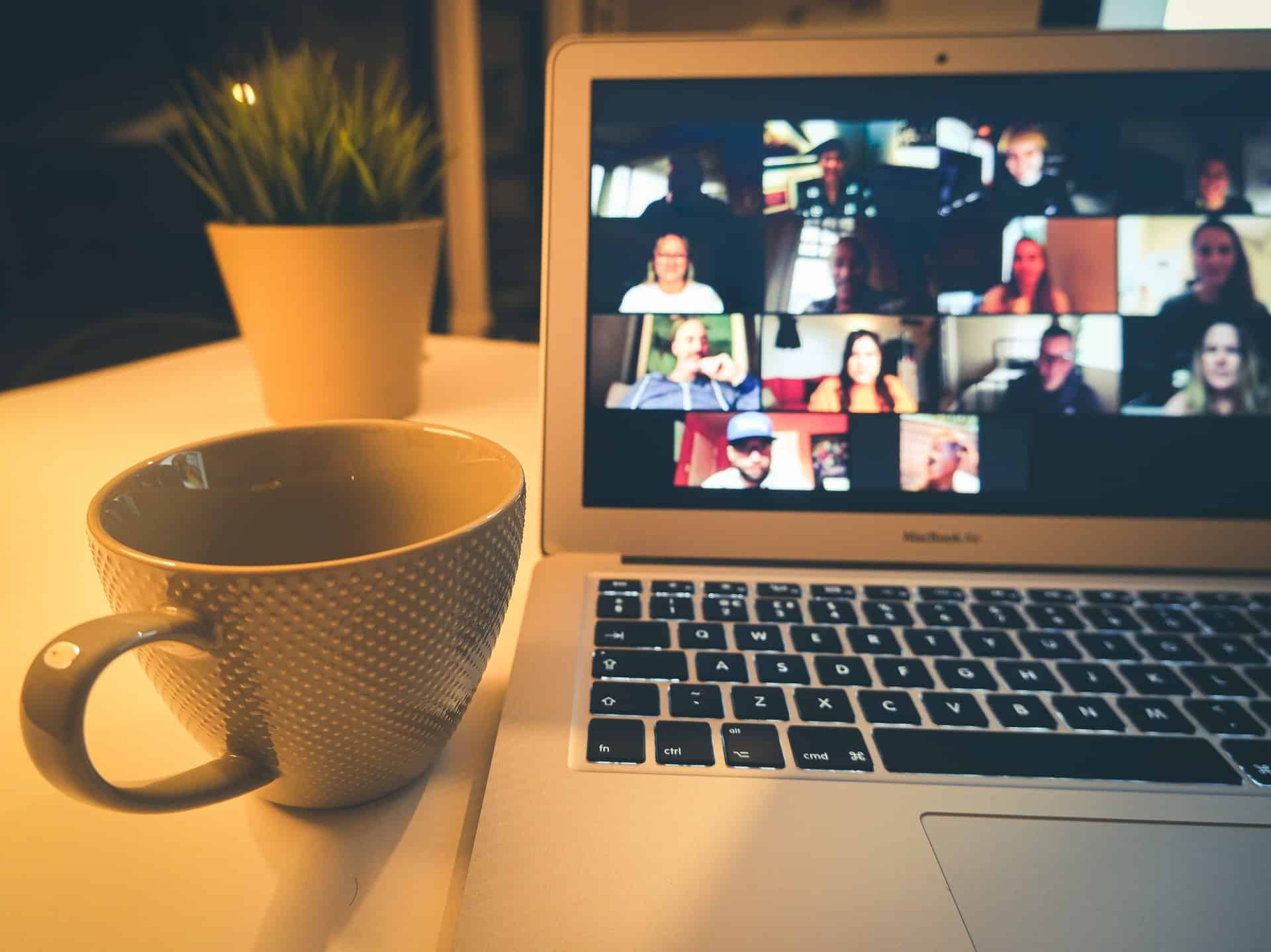 A Zoom meeting and coffee - the perfect opportunity to do virtual team building activities with your team.